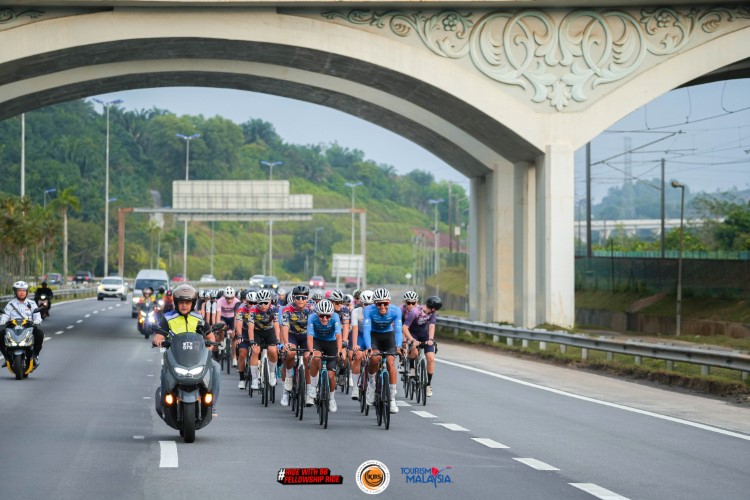 Cyclists passing by Cyberjaya