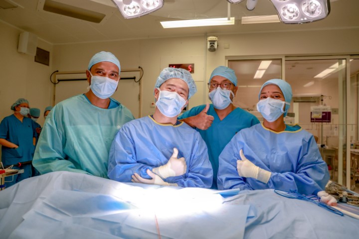 (2nd from left) Dr. Roger Anthony Idi, Consultant Urologist at Prince Court and Professor Imran Mushtaq, Consultant Paediatric Urologist at Great Ormond Street Hospital, together with the visiting observer surgeon and operating theatre nurse