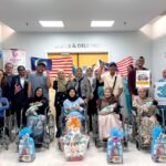 Five mothers and their newborn Merdeka babies celebrate with their families and the Columbia Asia Hospital Iskandar Puteri team under the Care Beyond Birth campaign